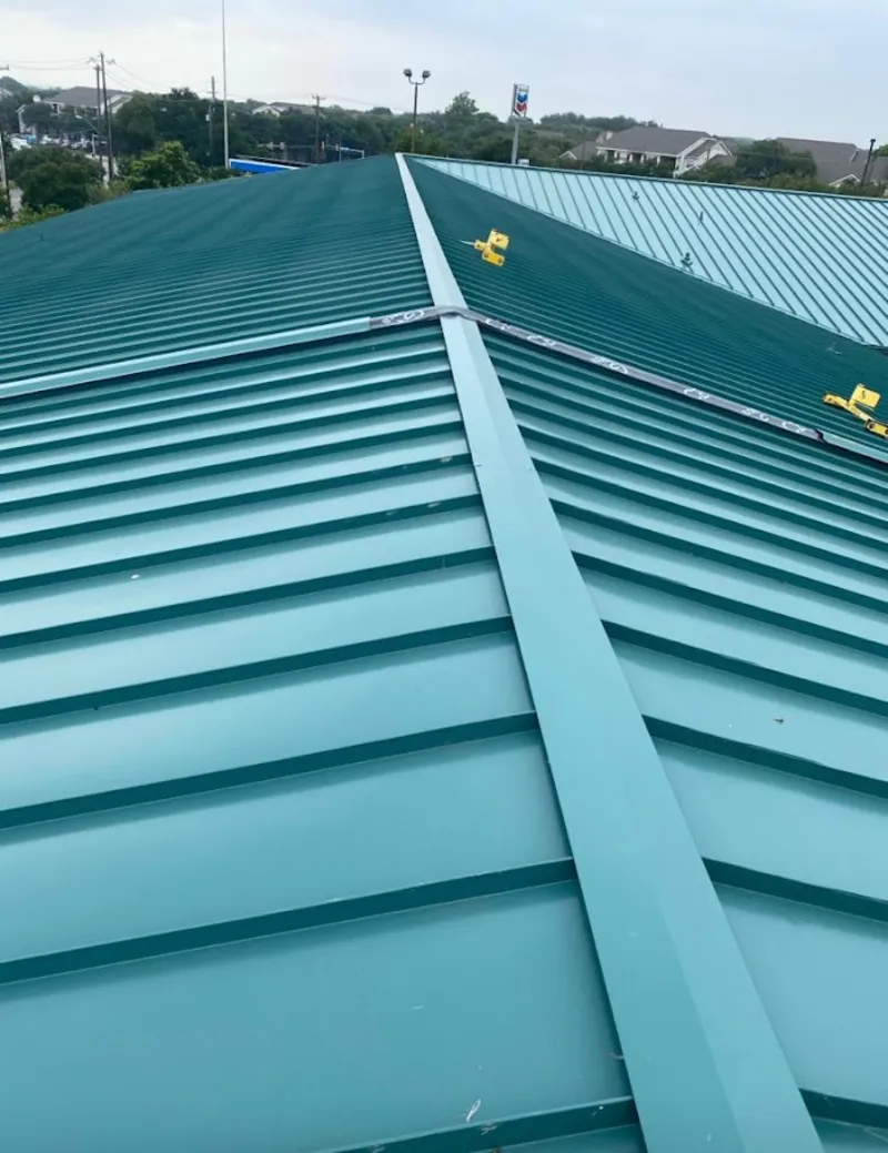 Green commercial metal roof ridge and valley for Metal Roof Repair in South Cleveland