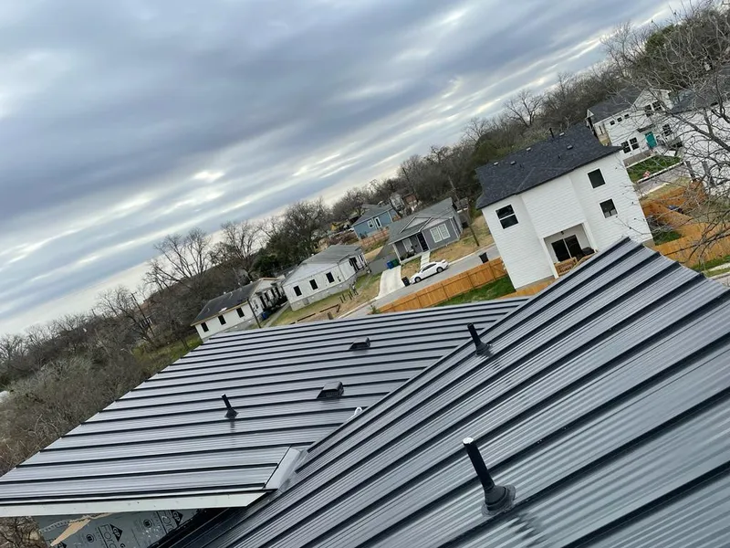 Standing seam metal roof panels with vents for Skylight Repair in South Cleveland